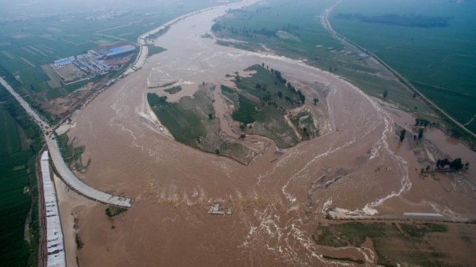 An aerial view shows that roads and fields are flooded in Xingtai